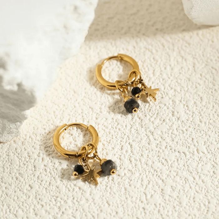 Gouden oorbellen black