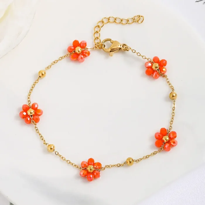 Stainless steel armband met bloemen van kralen.