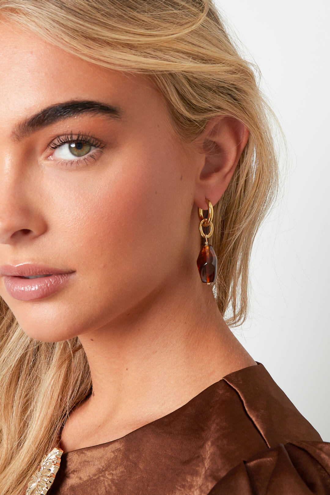 Oorbellen bruine steen goud